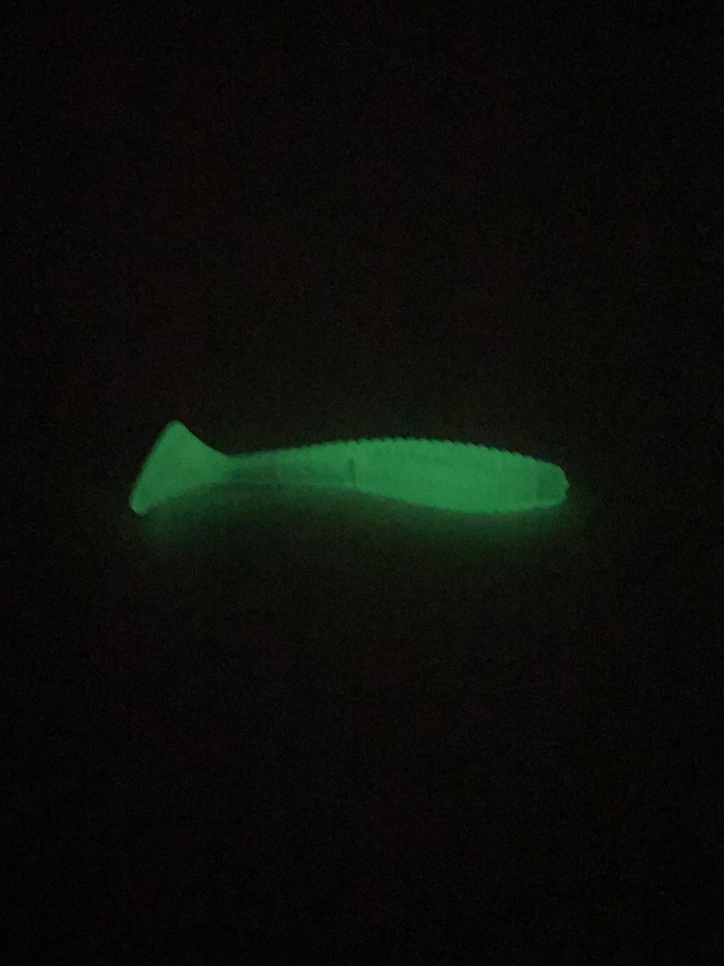 Glow in the dark 2.5” paddle tails